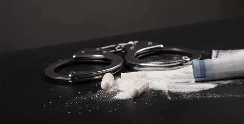 SLI - Arrest for drug dealing, handcuffs