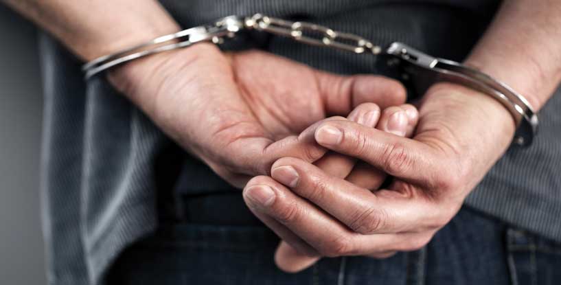 SLI - Criminal in handcuffs